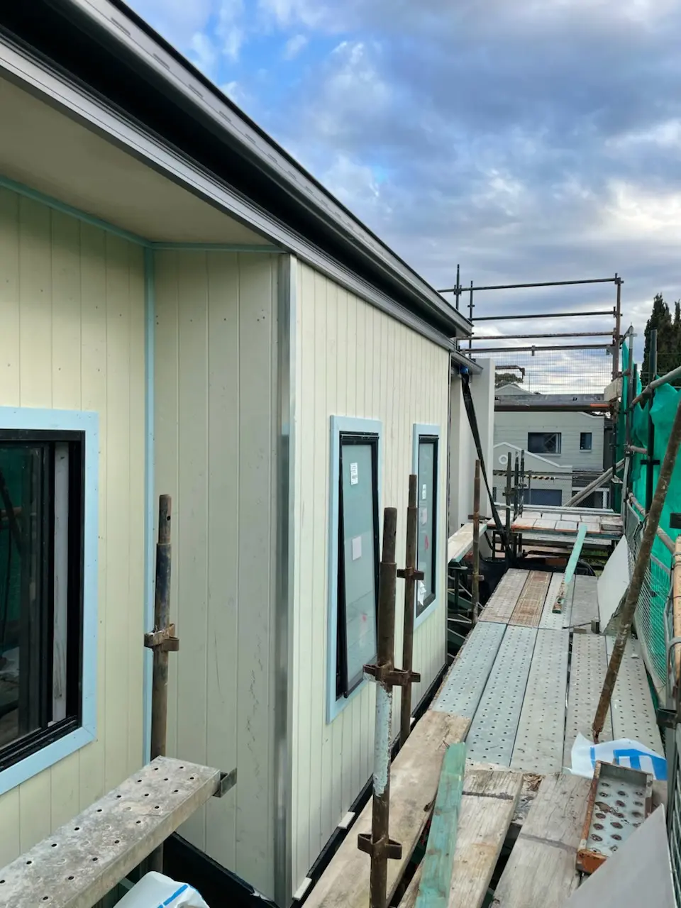 Timber batten external cladding installation on modern home in Sydney